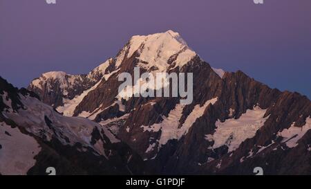 Mount Cook just after sunset. Purple sky. View from a place near Mueller hut. Stock Photo