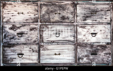 This is vintage white painted wooden drawers. Stock Photo