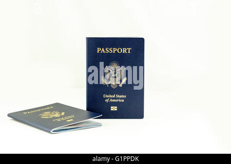 Two United States of America passport books on a white background. Stock Photo