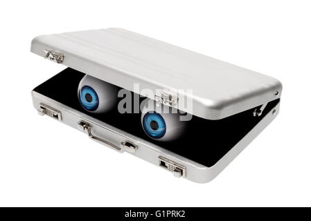 Isolated objects: pair of blue eyes looking out from aluminium briefcase, on white background Stock Photo