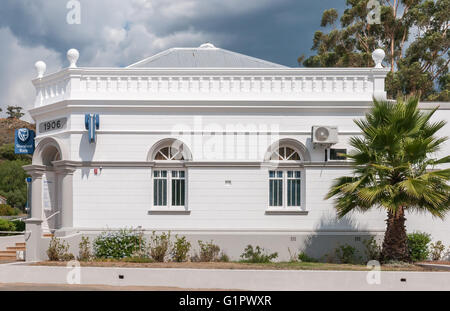 UNIONDALE, SOUTH AFRICA - MARCH 5, 2016: A storm brewing over a historic building in Uniondale, built in 1906 Stock Photo