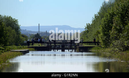 Children on the locks of the Forth and Clyde canal near Clydebank, Glasgow, Scotland, UK. Stock Photo