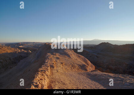 Tourists in Valle de la Luna at sunset, near San Pedro de Atacama, Atacama Desert, Chile Stock Photo