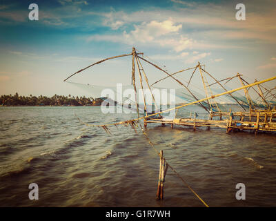 Chinese fishnets on sunset. Kochi, Kerala, India Stock Photo