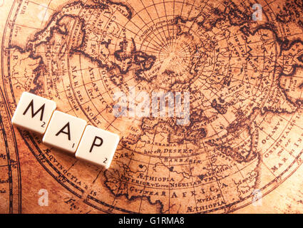The white text map on a brown world map Stock Photo