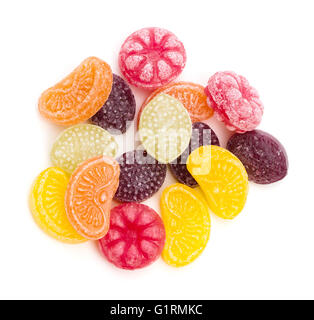 An assortment of fruit flavored hard candy on a white background Stock Photo