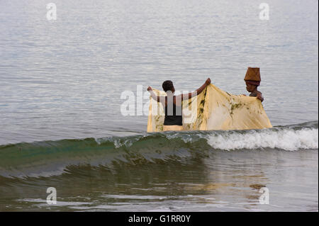 Women fishing with a net in Antongil Bay, Maroantsetra, Madagascar Stock Photo