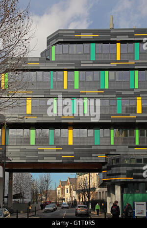 G E Fogg Building, Queen Mary University, London. An over-clad 1960's concrete building which spans a residential street Stock Photo