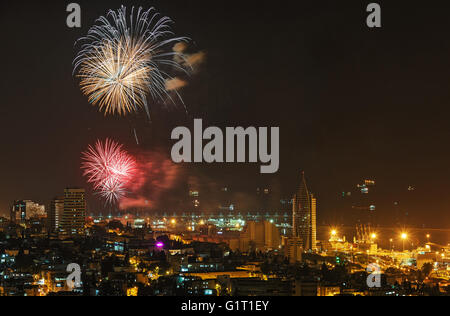 Beautiful fireworks on the background of the Bay of Haifa Stock Photo