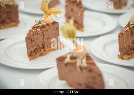 A collection of chef prepared chocolate desserts placed on a table, landscape format aspect ratio. Stock Photo