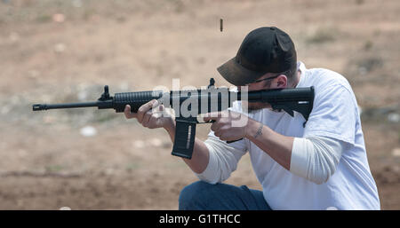 Usa. 19th Apr, 2016. Steven Hawkins target practices with his new AR-15 at a shooting range on BLM land near La Cienega, Tuesday April 19, 2016. New Mexico Game and Fish hope to build a State shooting range in the area. © Eddie Moore/Albuquerque Journal/ZUMA Wire/Alamy Live News Stock Photo