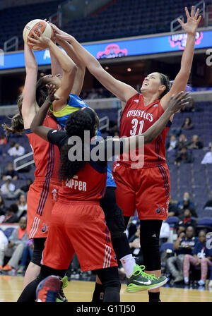 Washington, DC, USA. 18th May, 2016. 20160518 - Washington Mystics center STEFANIE DOLSON (31), Washington Mystics center EMMA MEESSEMAN (33), left, and Washington Mystics forward KAHLEAH COPPER (2) defend a shot by Dallas Wings forward AERIAL POWERS (23) in the first half at the Verizon Center in Washington. © Chuck Myers/ZUMA Wire/Alamy Live News Stock Photo
