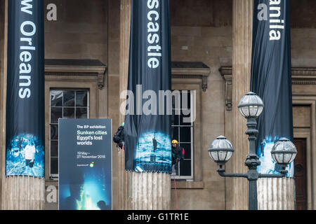 London, UK. 19th May, 2016. Greenpeace activists at the British Museum climbing on its columns where they have hung 7 giant banners on the opening day of the BP-sponsored 'Sunken Cities' exhibition, pointing out BP's responsibility for global warming, promoting the sale of oil leading to unstable weather and sea level rise which is now flooding cities and communities around the world. The banners named and showed images of flooding in the UK and worldwide and renamed the show 'Sinking Cities' to reflect BP's activities. Peter Marshall/Alamy Live News Stock Photo