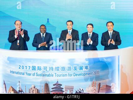 Beijing, China. 19th May, 2016. Chinese Premier Li Keqiang (C) attends the opening ceremony of the First World Conference on Tourism for Development in Beijing, capital of China, May 19, 2016. © Wang Ye/Xinhua/Alamy Live News Stock Photo