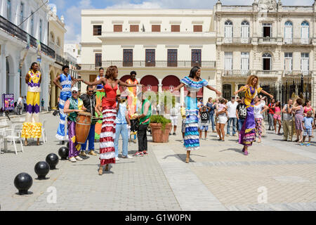 Street performers dancing on stilts in Plaza Vieja (Old Square), Habana (Havana), Cuba Stock Photo