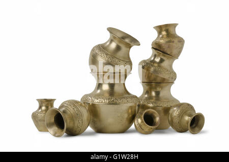 Brass utensils (miniatures) on the white background, Studio shot, Pune, Maharashtra, India Stock Photo