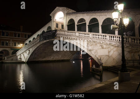 View of Rialto bridge illuminated at night. Stock Photo