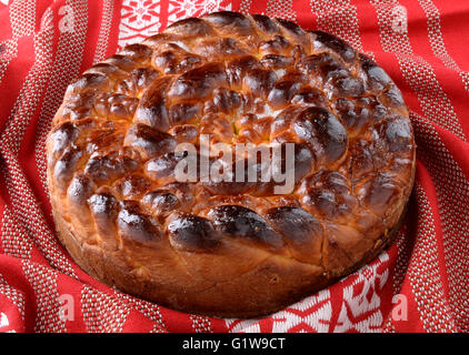 traditional sweat course for easter pasca on red tablecloth Stock Photo