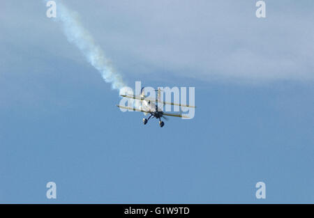 Utterly Butterly sponsored bi-plane with wing walkers at airshow Stock Photo