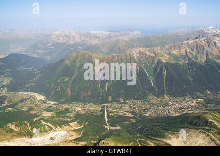 Foggy summer landscape with Chamonix aerial view and mountains in Mont Blanc, top massif in France Stock Photo