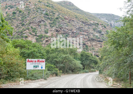 BAVIAANSKLOOF, SOUTH AFRICA - MARCH 6, 2016: Signboard for a supermarket in the Baviaanskloof (baboon valley). Stock Photo