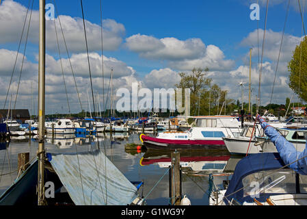 Boats moored on Oulton Broad, Norfolk Broads National Park, Norfolk, England UK Stock Photo
