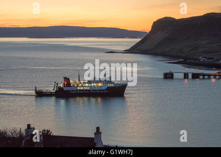 mv hebridean isles approaching uig harbour at sunset, skye Stock Photo