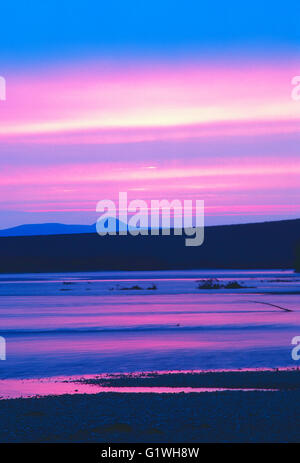 Beautiful sunset skies on the Belaya River; Siberia; Chukchi Peninsula; Magadan Region; Russian Federation; former USSR - Soviet Stock Photo