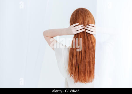 Back view portrait of redhead woman Stock Photo