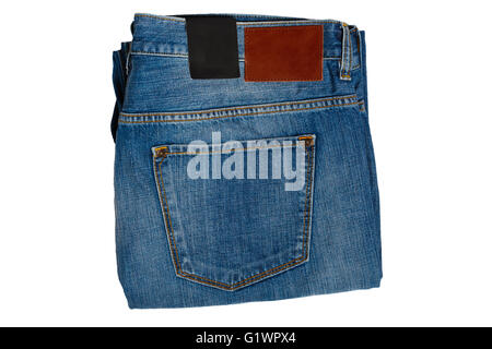 fashion blue jeans folded isolated on white background. Stock Photo