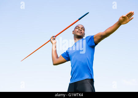 Athlete about to throw a javelin Stock Photo