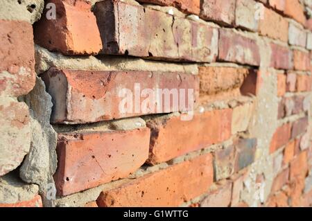 Detail of old brick wall background in perspective Stock Photo