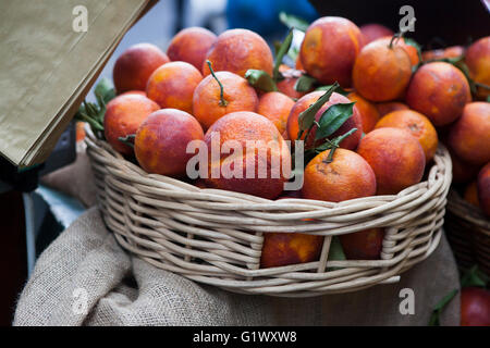 bloody red oranges in basket Stock Photo