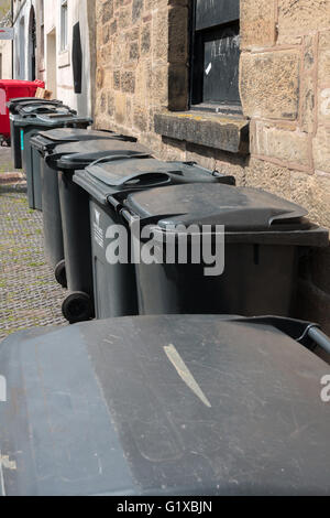 General waste bins waiting for collection Stock Photo