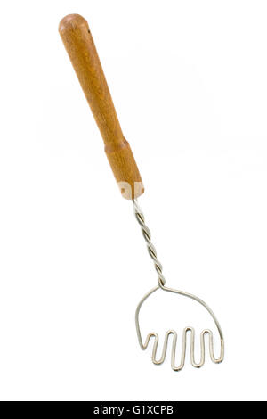 Old potato masher isolated on white Stock Photo