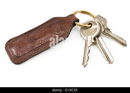 Keys with leather tag isolated on white Stock Photo