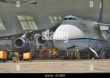 Kiev, Ukraine - August 3, 2011: Antonov An-124 Ruslan cargo plane being maintenanced in hangar Stock Photo