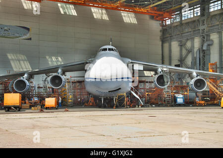 Kiev, Ukraine - August 3, 2011: Antonov An-124 Ruslan cargo plane being maintenanced during the regular check Stock Photo