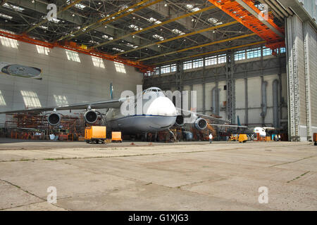 Kiev, Ukraine - August 3, 2011: Antonov An-124 Ruslan cargo plane being maintenanced during the  check Stock Photo