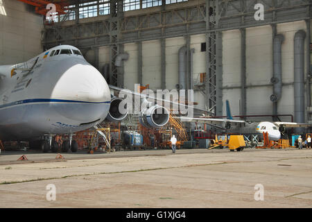 Kiev, Ukraine - August 3, 2011: Antonov An-124 Ruslan cargo plane being maintenanced in service hangar Stock Photo
