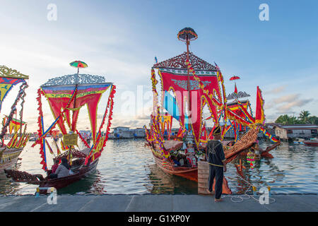 Traditional Bajau's boat called Lepa Lepa decorated with colorfull Sambulayang flag Stock Photo