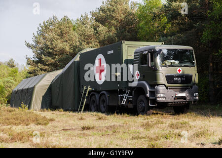 MUNSTER / GERMANY - MAY 2012: german rescue center system on trucks stands in a wood on may 2012 in munster, germany. Stock Photo