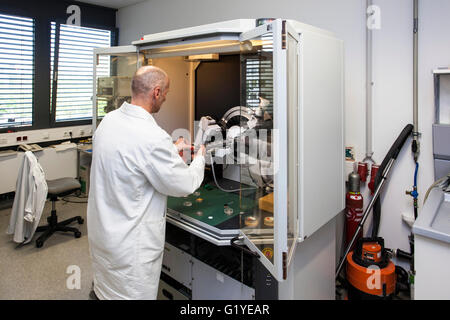 Geologist at the X-ray machine Stock Photo - Alamy