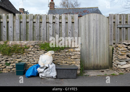 Rubbish and recycling bags on a street in Fairford, Gloucestershire; UK Stock Photo
