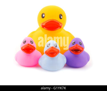 Big rubber duck with little ones, concept of a single parent family; on white Stock Photo