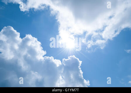 Sun between the clouds against the sky. Stock Photo