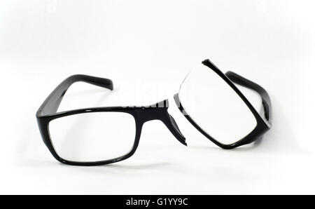 A pair black  broken eyeglasses, white background, horizontal Stock Photo