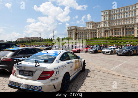 Super cars of the exclusive Gumboil 3000 parked in front of the Romanian Parliament. Gumball is an international celebrity rally