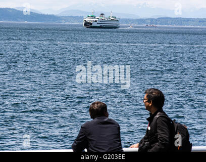 A ferry transports people and cars across Puget Sound Stock Photo