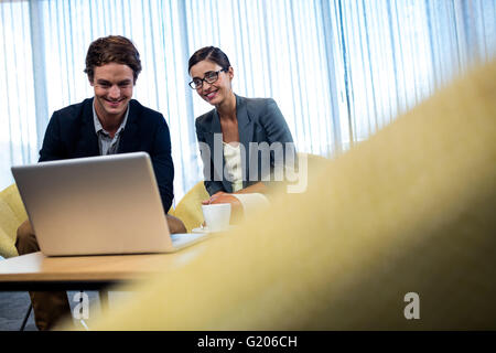 Businessmen working on computer Stock Photo